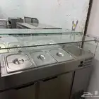 برادة سلطات فوق الطاولة