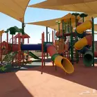 Garden games  swings  waste baskets  and wooden chairs