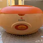 جهاز تسخين الشمع