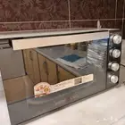 للبيع فرن كهربائي ماركة هوم الك ومكنسة كهربائي ماركة هيتاشي