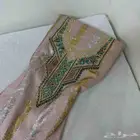 مخاوير قطع غير مخيطة تطريز على الصدر والاكمام