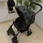 عربة أطفال من جونيورز بحالة ممتازة