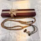 سبحة زيتون 99 خرزة بحزام ملون مع عد اد