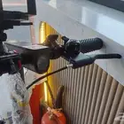 سكوتر كهربائي شبه جديد شحنه فل تمشي 20 -25 كيلو بمنطقة مسطحة