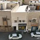 للبيع عمارة سكنية تجارية في حي الشميسي