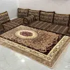 جلسة ارضيه مع طاولة تلفزيون
