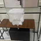 مدخلين الواحد ب100 والطاوله مع اربع كراسي 200