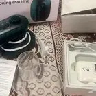 مكواة بخار وموزع زيت