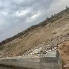 ارض للبيع مخطط الشهداء خلف فندق عابر