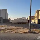 ارض سكنية المذنب حي الروضة على شارعين
