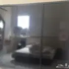 دولاب اسود زجاج مكون من 3 اقسام