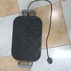 أله لصنع القطايف