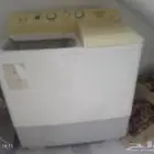غساله نضيفه بس خربانه تقدر تصلحها وتشتغل معك وبسعر