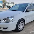 لانسر 2014 قير ومكينه بحاله جيده مكيف يحتاج كمبرسر مجدد مفحو