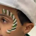 رسم على الوجه اليوم الوطني