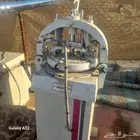 آلة تقسيم عجين يدوية.