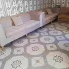 كنب مستعمل للبيع اللون س كري.