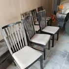 عدد 7 كراسي خشب شبه جديده