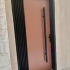 ابواب حديد ابواب المينوم شبابيك مظلات سواتر