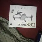 drone and playstation 4 wireless controller and also ps 5