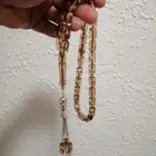 سبحة كهرمان مطعمة صدف كاملة (جديدة).