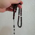 سبحة كهرمان لون عنابي صافية (جديدة).