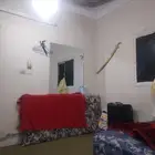 غرفه مع حمام مشترك حي الوزيرية الشارع البيك جد دور ثالث 1200