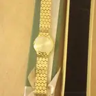 ساعه اومكس كوارتز مطليه بالذهب