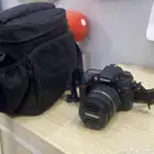 كاميرا نيكون D7000 نظيفة مع عدسة 50 mm