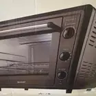 فرن كهربا 60 لتر وعدد 2 كرسي هزاز