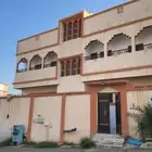 للبيع عماره اربع شقق في حي شباعه خميس مشيط