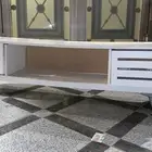 طاوله تلفزيون ممتازه بيضا خشب