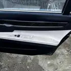 صدام بي ام دبليو 750i للبيع   ديكورات ابواب