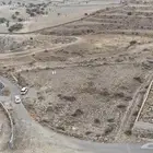 ارض زراعيه في ابها داخل النطاق العمراني مساحة 53الف الموظفين