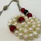 سبحة لؤلؤ طبيعي مطعمة ياقوت احمر وعقيق اسود