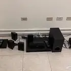 بروجكتر وشاشه وسيستم صوتي ومشغل بلوراي