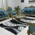 كنب مع طاولات وسجاده