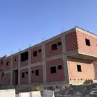 عمارتين مبنية عظم على مساحه ارض 1250