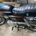 AX100 سوزوكي