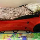سوير اطفال على شكل سيارة