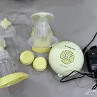 جهاز شفط الحليب وجهاز تدفئه