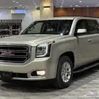 يوكن 2016 SLE طويل (عرض اليوم الوطني)