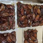 يوجد تمر صفري حبه كبيره واشعل الحجم ربع كيلو شي فاخر فيه