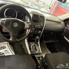 سوزوكي قراند فيتارا موديل 2009 نص فل ابيض داخلية اسود