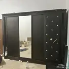 دولاب غرفه وغساله ولوحه