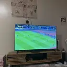 تلفزيون 65 بوصة