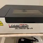 الة قطع خشب باليزر