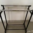 علاقه ملابس قابله لزياده الطول وحامل كبكيك وصنابير الكورن ف