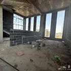 محطة بنزين بها محلات تجارية