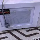 ميكرويف شبه الجديد اشتغل